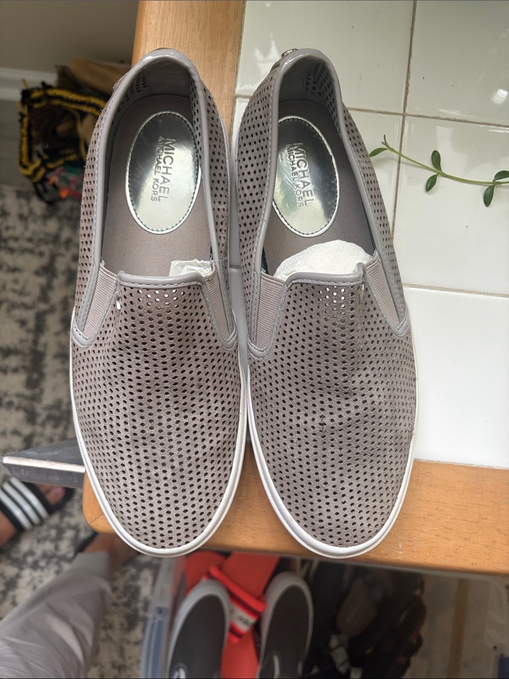Michael Kors Women’s Grey Slip-On Perforated Sneakers